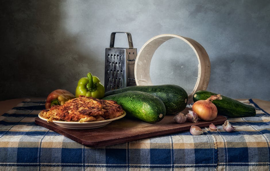 Fresh vegetables and pancakes arranged in a rustic kitchen setting, perfect for culinary inspiration.